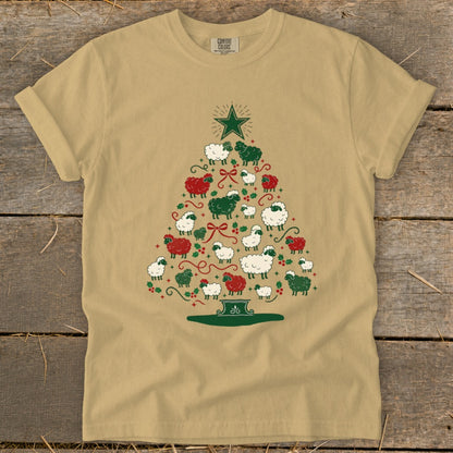 Tan t-shirt with Christmas tree made of white and green sheep with red bows.