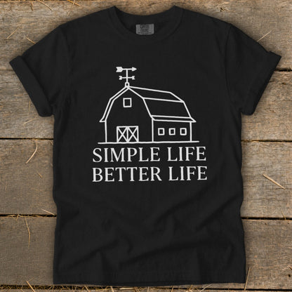 Black t-shirt with white barn graphic and text "SIMPLE LIFE BETTER LIFE."