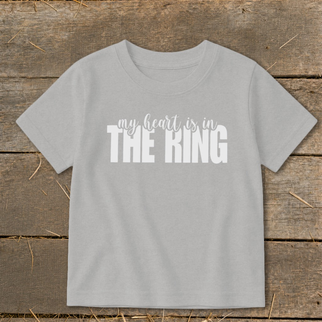 Light gray t-shirt with white text reading "my heart is in THE RING".