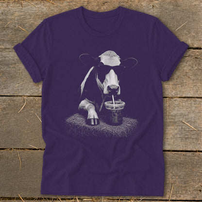 T-shirt with a graphic of a cow wearing sunglasses drinking from a cup.