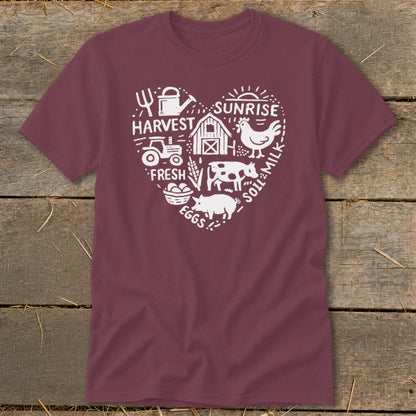 Maroon t-shirt with heart-shaped farm graphic and text.