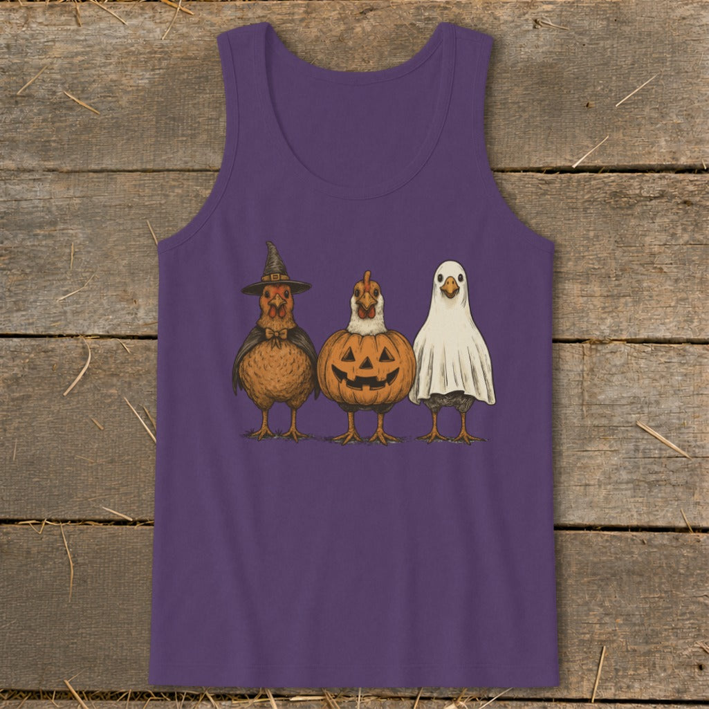 Three chickens dressed for Halloween: witch, pumpkin, and ghost, printed on a purple tank top.