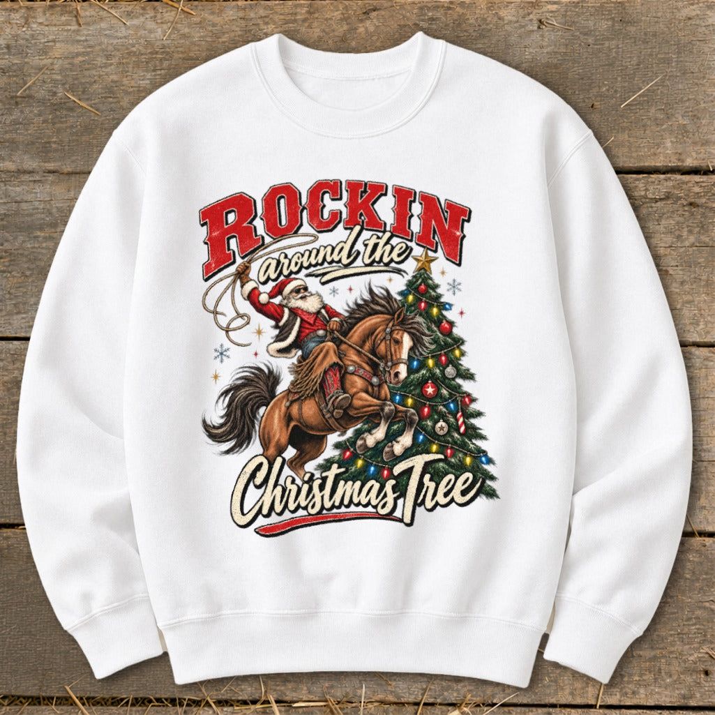 Santa riding a horse with lasso near a decorated Christmas tree, text "Rockin around the Christmas Tree".