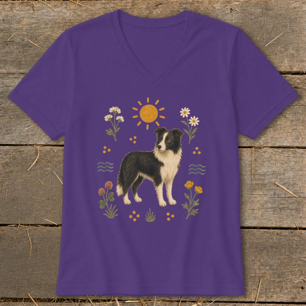 Purple v-neck t-shirt with a Border Collie surrounded by flowers and a sun graphic.