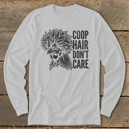 White long-sleeve shirt with a graphic of a chicken and the text "COOP HAIR DON'T CARE".