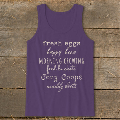 Purple tank top with "fresh eggs happy hens morning crowing feed buckets cozy coops muddy boots" text.