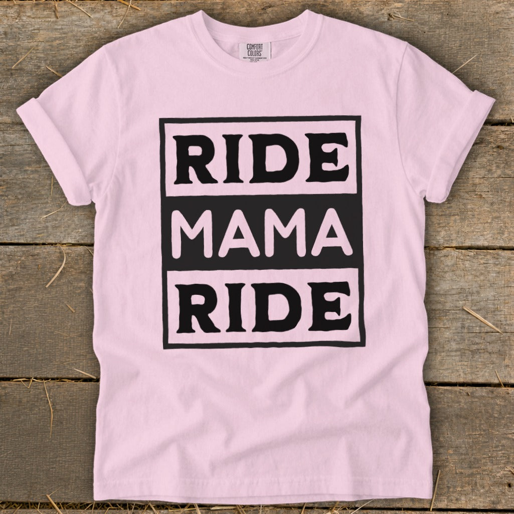 Pink t-shirt with black text boxes reading "RIDE MAMA RIDE".