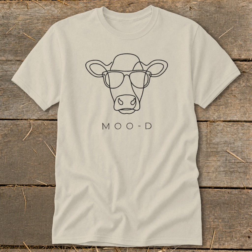 Cream t-shirt with minimalist black line drawing of a cow wearing glasses and text "MOO-D".