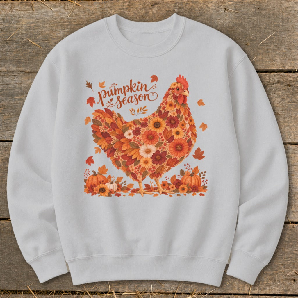 White sweatshirt with a chicken design made of autumn leaves and flowers, saying "Pumpkin Season."