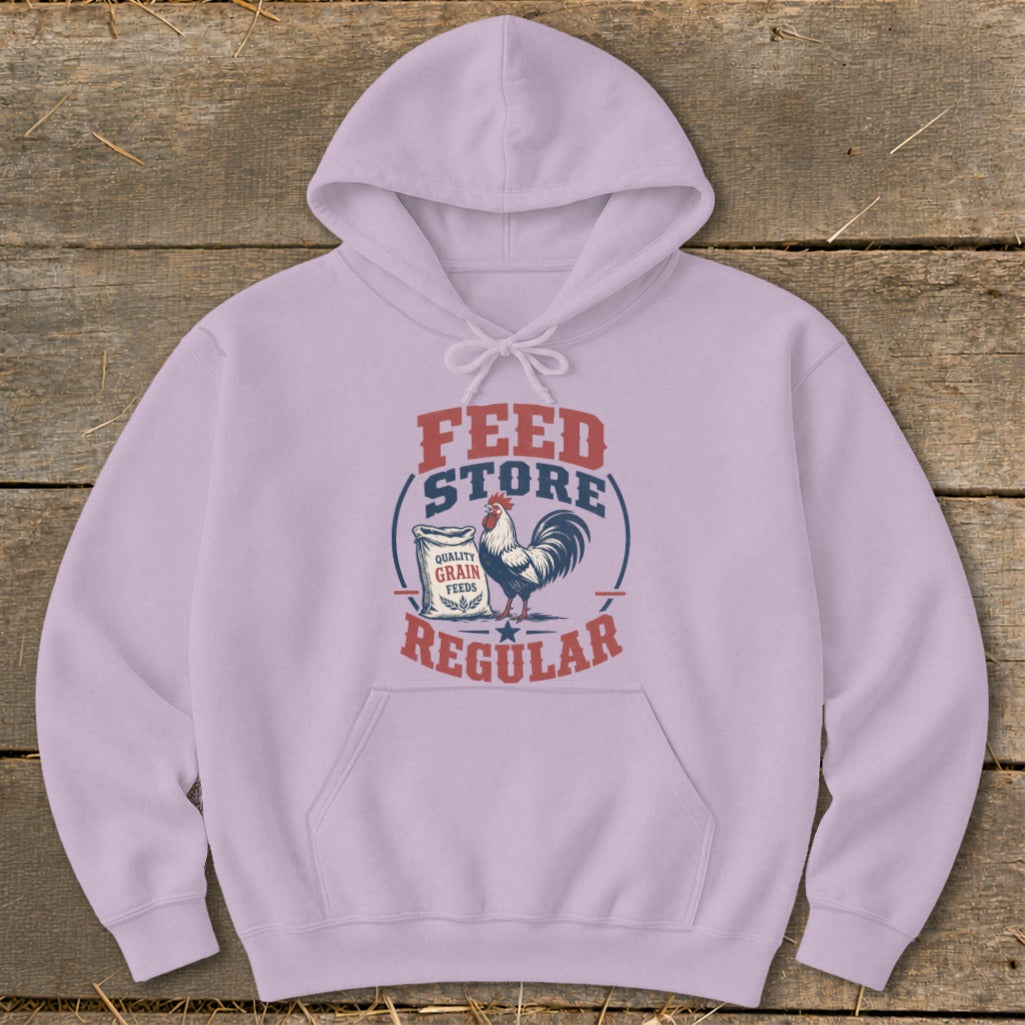 Light purple hoodie with "Feed Store Regular" graphic and rooster on a sack of grain.