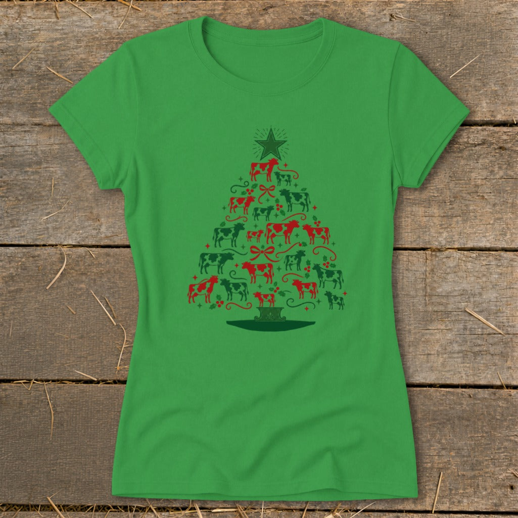Green t-shirt with a Christmas tree made of red and black cows.