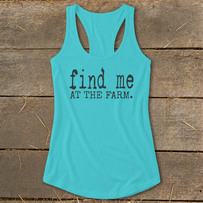 Turquoise racerback tank top with "find me AT THE FARM." text.