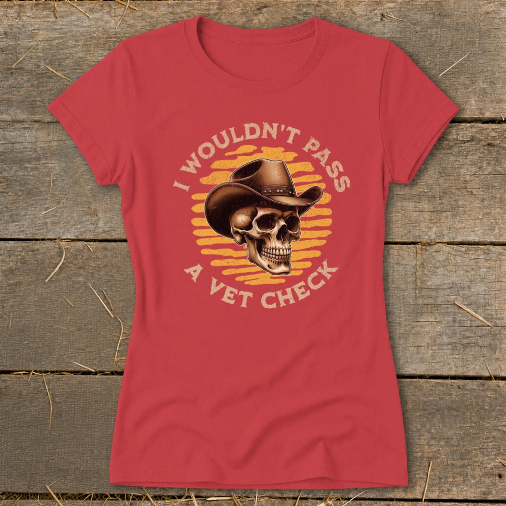 Red t-shirt with skull wearing cowboy hat and text "I wouldn't pass a vet check".