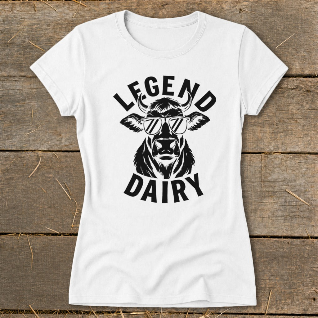 White t-shirt with a black graphic of a cow wearing sunglasses and the text "LEGEND DAIRY".