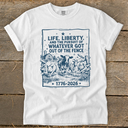 White t-shirt with "Life, Liberty, and the Pursuit of Whatever Got Out of the Fence" and farm animals.