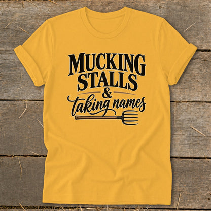 Yellow t-shirt with "Mucking Stalls & Taking Names" and a pitchfork graphic.