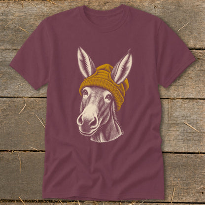 Burgundy t-shirt with a drawing of a donkey wearing a yellow beanie.