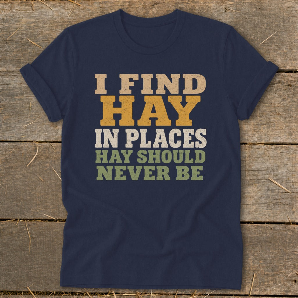 Navy t-shirt with text "I FIND HAY IN PLACES HAY SHOULD NEVER BE".