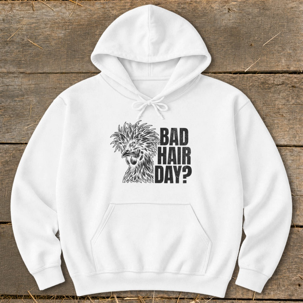 White hoodie with a black ink drawing of a fluffy chicken and the text "BAD HAIR DAY?".