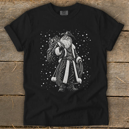 Black t-shirt with a cowboy Santa Claus graphic and falling snow.
