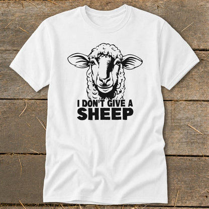 White t-shirt with black graphic of a sheep and text "I DON'T GIVE A SHEEP".