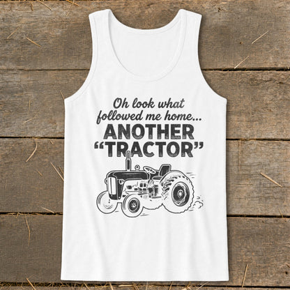 White tank top with "Oh look what followed me home... ANOTHER 'TRACTOR'" and tractor graphic.