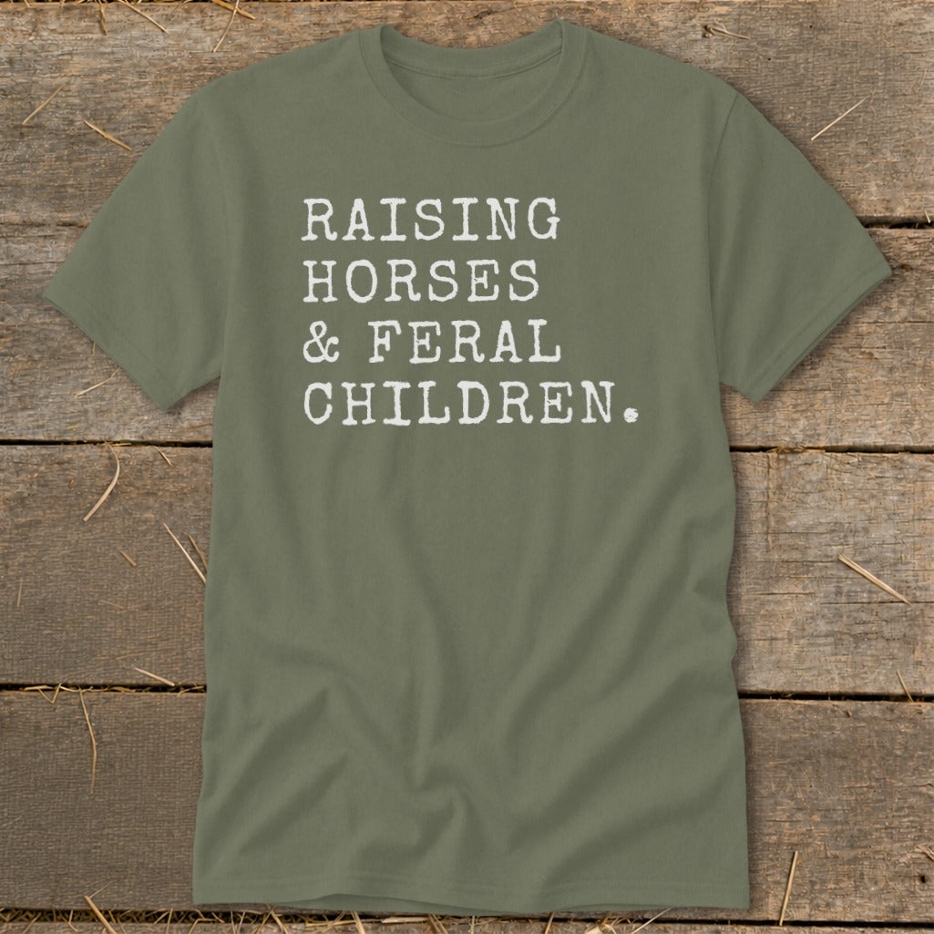 Olive green t-shirt with white text "RAISING HORSES & FERAL CHILDREN."