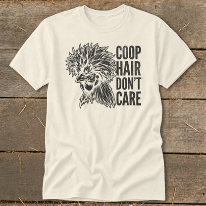 Cream t-shirt with black graphic of a chicken head and text "COOP HAIR DON'T CARE".