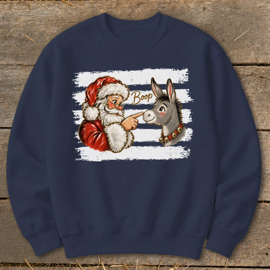 Santa boops a donkey on the nose with the word "Boop" in text.