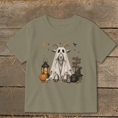 Halloween goat in ghost costume with pumpkins, lantern, and spooky signs.
