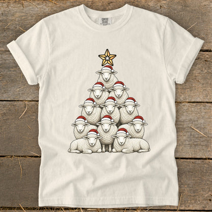 Sheep arranged in a Christmas tree shape wearing Santa hats, topped with a star.