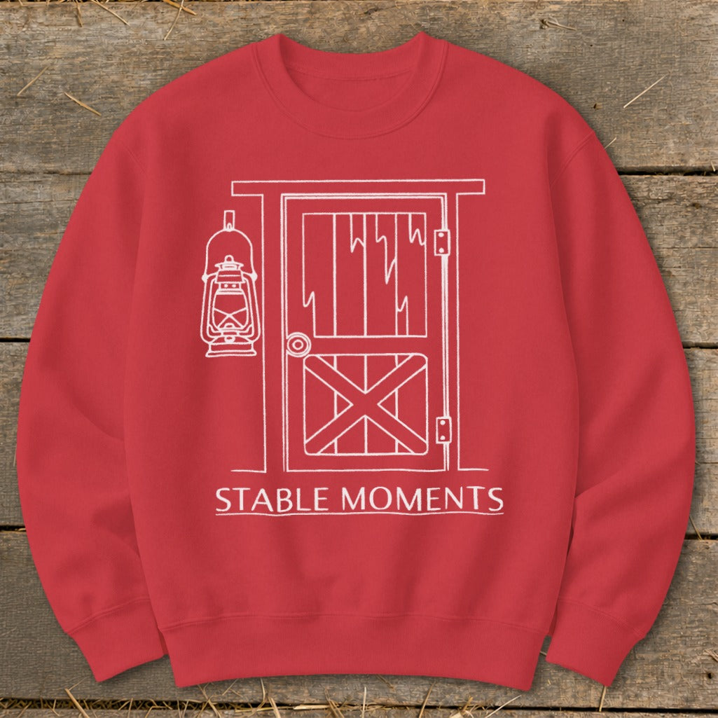 Red sweatshirt with white barn door graphic and text "STABLE MOMENTS".