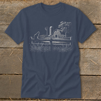T-shirt with white sketch of a cat on a fence, barn, windmill, and tree.