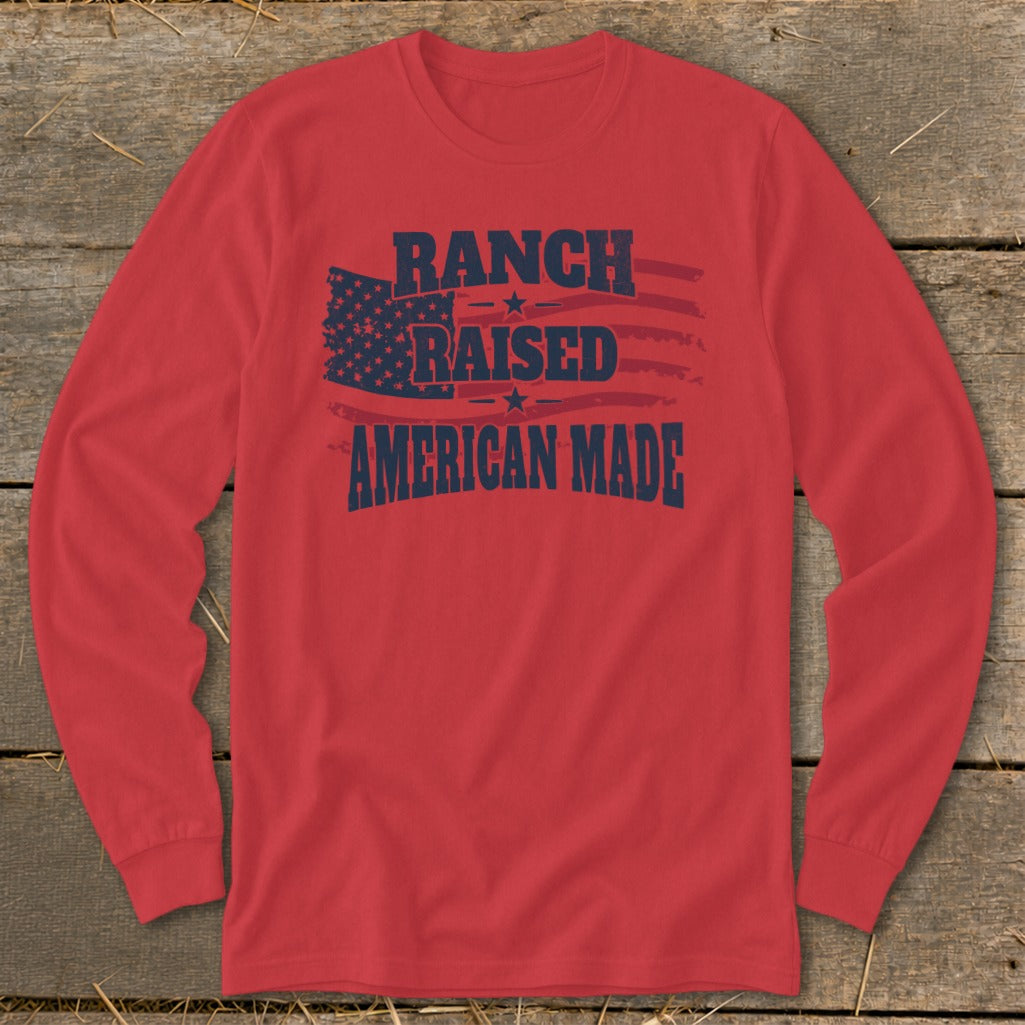Red long-sleeve shirt with "RANCH RAISED AMERICAN MADE" and distressed American flag graphic.