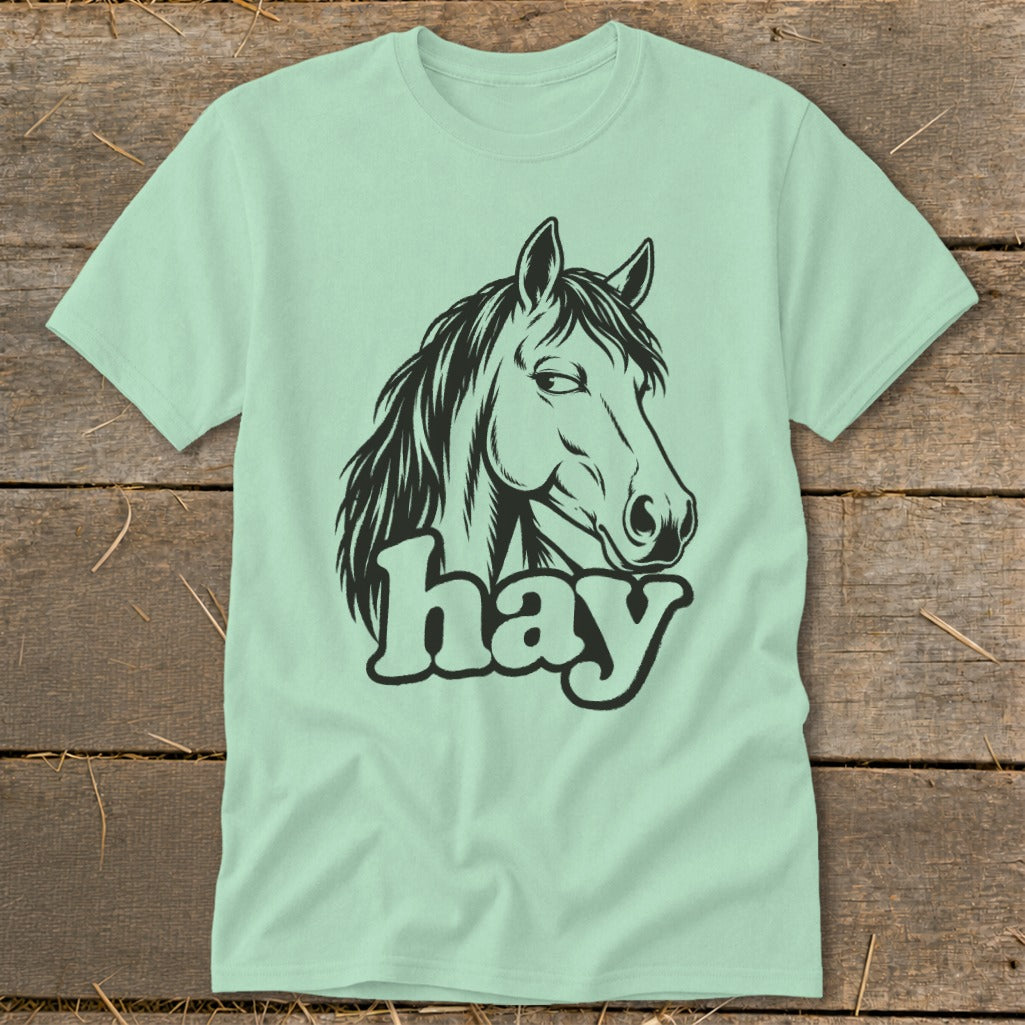 Light green t-shirt with a black graphic of a horse's head and the word "hay".