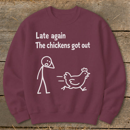 Maroon sweatshirt with white text "Late again The chickens got out" and cartoon.