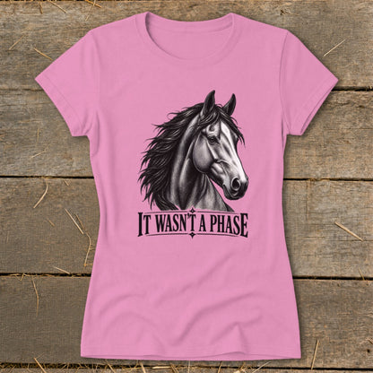 Pink t-shirt with a charcoal drawing of a horse's head and the text "IT WASN'T A PHASE".