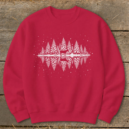 Red crewneck sweatshirt with white forest and deer reflection graphic.