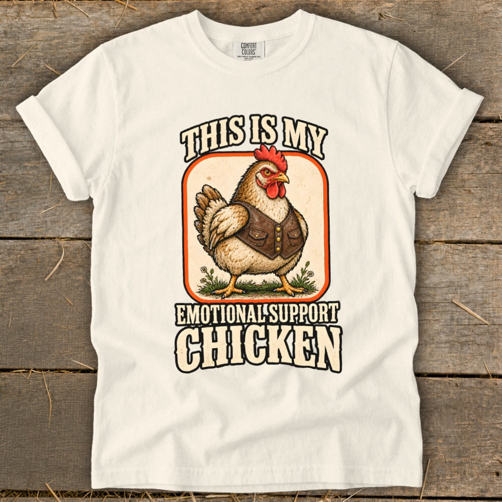 White t-shirt with "This is my emotional support chicken" text and chicken graphic.