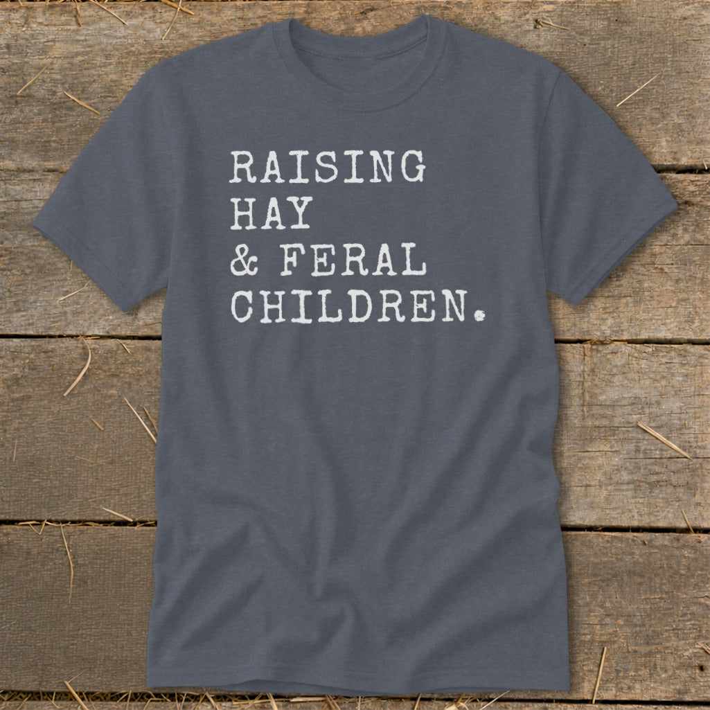 Gray t-shirt with white text: "RAISING HAY & FERAL CHILDREN."