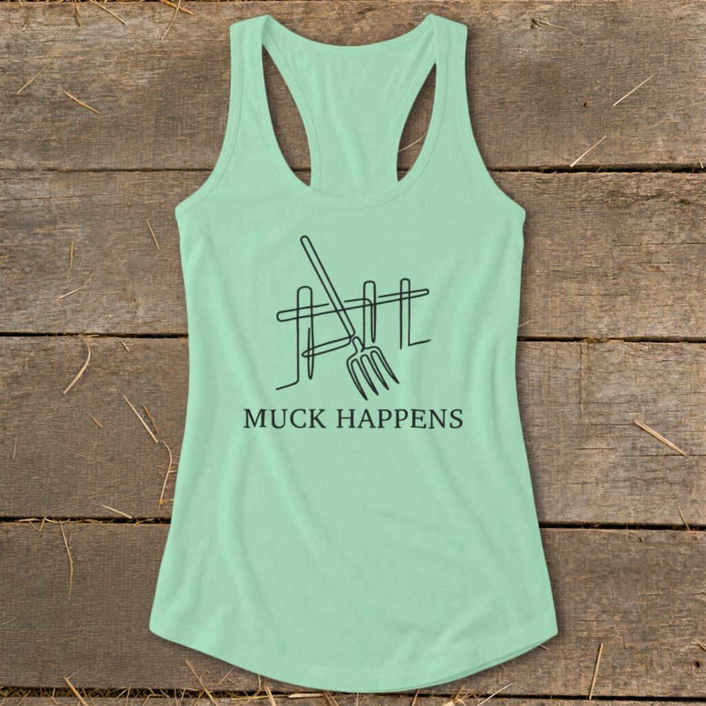 Mint green tank top with a line drawing of a pitchfork and fence with text "MUCK HAPPENS".