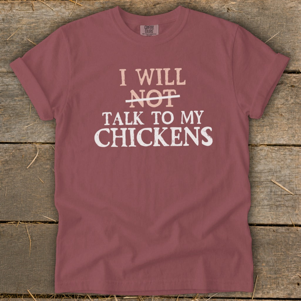 Maroon t-shirt with "I WILL NOT TALK TO MY CHICKENS" graphic.