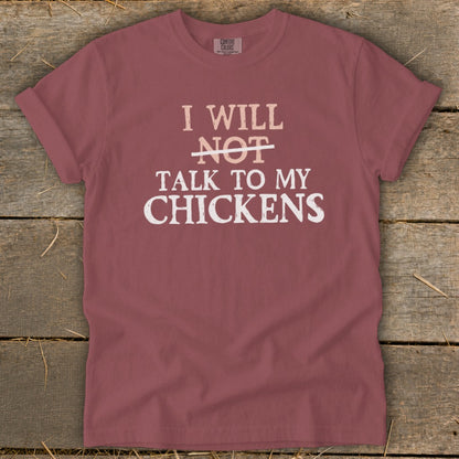 Maroon t-shirt with "I WILL NOT TALK TO MY CHICKENS" graphic.