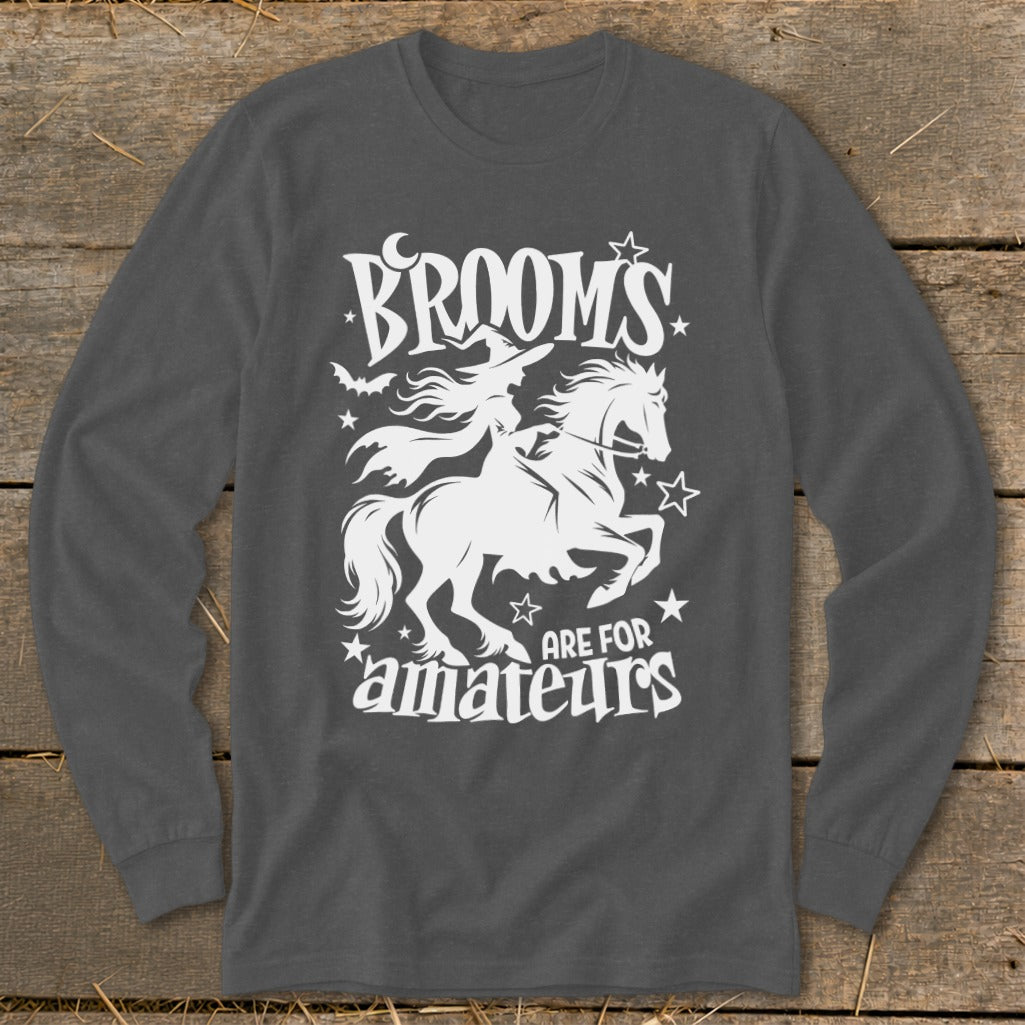 White witch on horseback graphic with text "Brooms are for amateurs".