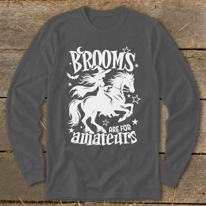 White witch on horseback graphic with text "Brooms are for amateurs".