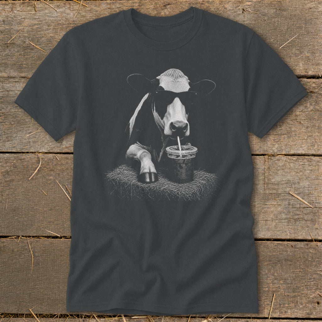 Cow wearing sunglasses and drinking from a cup with a straw.