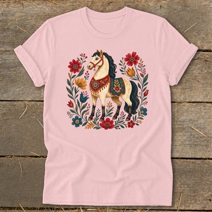 Pink t-shirt with a cream horse and floral wreath design.