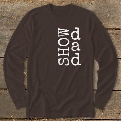 Brown long-sleeve shirt with white text reading "SHOW" and "dad" vertically.