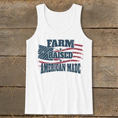 White tank top with "FARM RAISED AMERICAN MADE" in distressed text over an American flag design.
