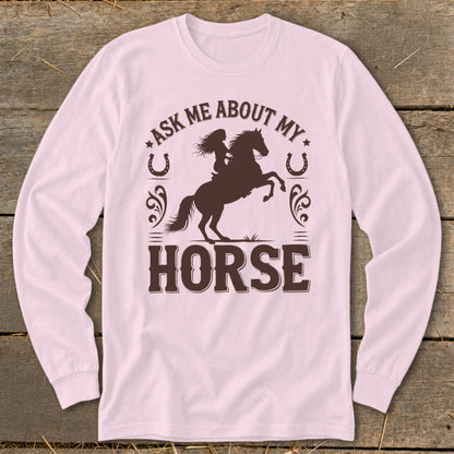 Pink long-sleeve shirt with "Ask me about my horse" graphic.